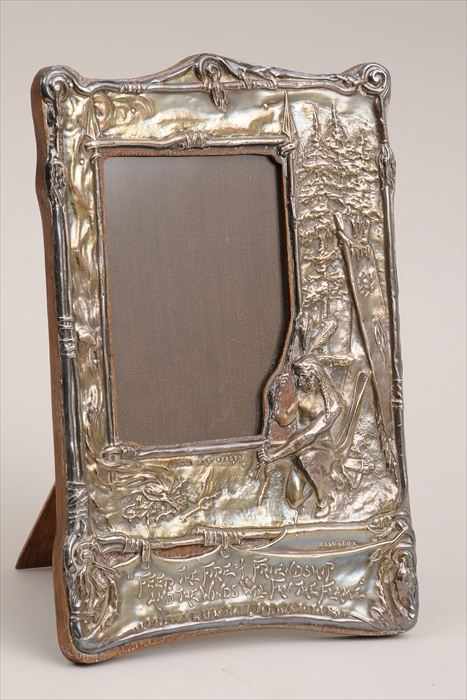 Appraisal: ENGLISH ART NOUVEAU SILVER-ON-OAK PICTURE FRAME HIAWATHA Marks for Birmingham