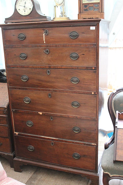 Appraisal: A VICTORIAN CHEST OF GRADUATED DRAWERS standing on bracket feet