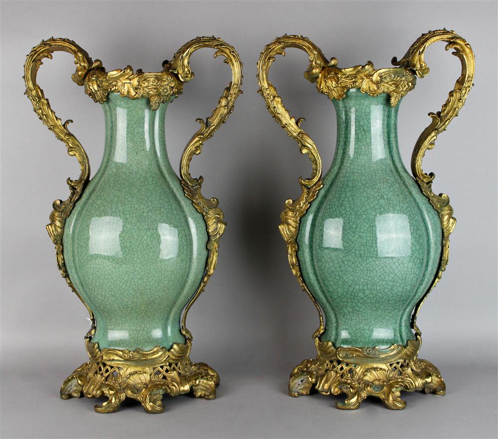 Appraisal: PAIR OF LOUIS XV STYLE GILT-BRONZE MOUNTED CRACKLE-GLAZED CELADON VASES