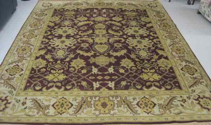 Appraisal: HAND KNOTTED ORIENTAL CARPET Indo-Persian overall stylized floral decoration on