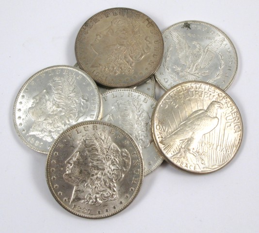 Appraisal: SEVEN U S SILVER DOLLARS including six Morgan type and