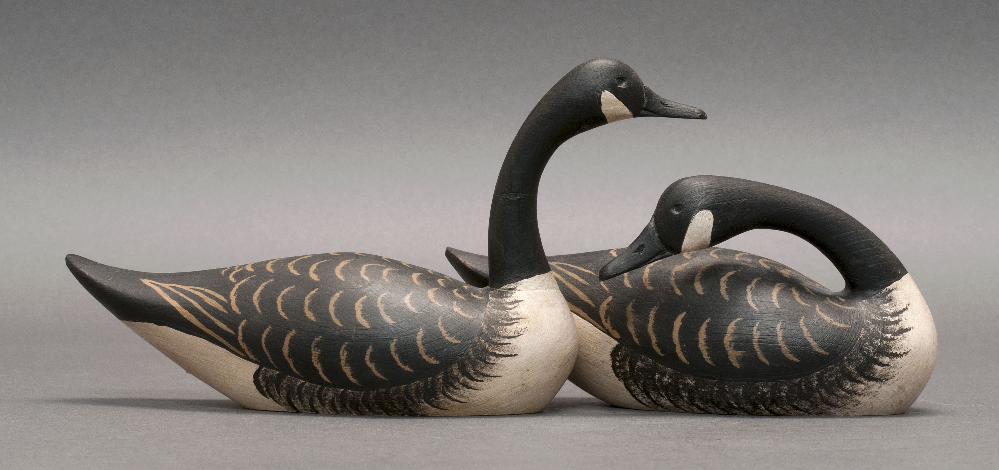 Appraisal: PAIR OF MINIATURE CANADA GEESE th CenturyBy Byron Bruffee of