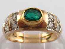 Appraisal: A yellow metal tests carat gold emerald and diamond ring