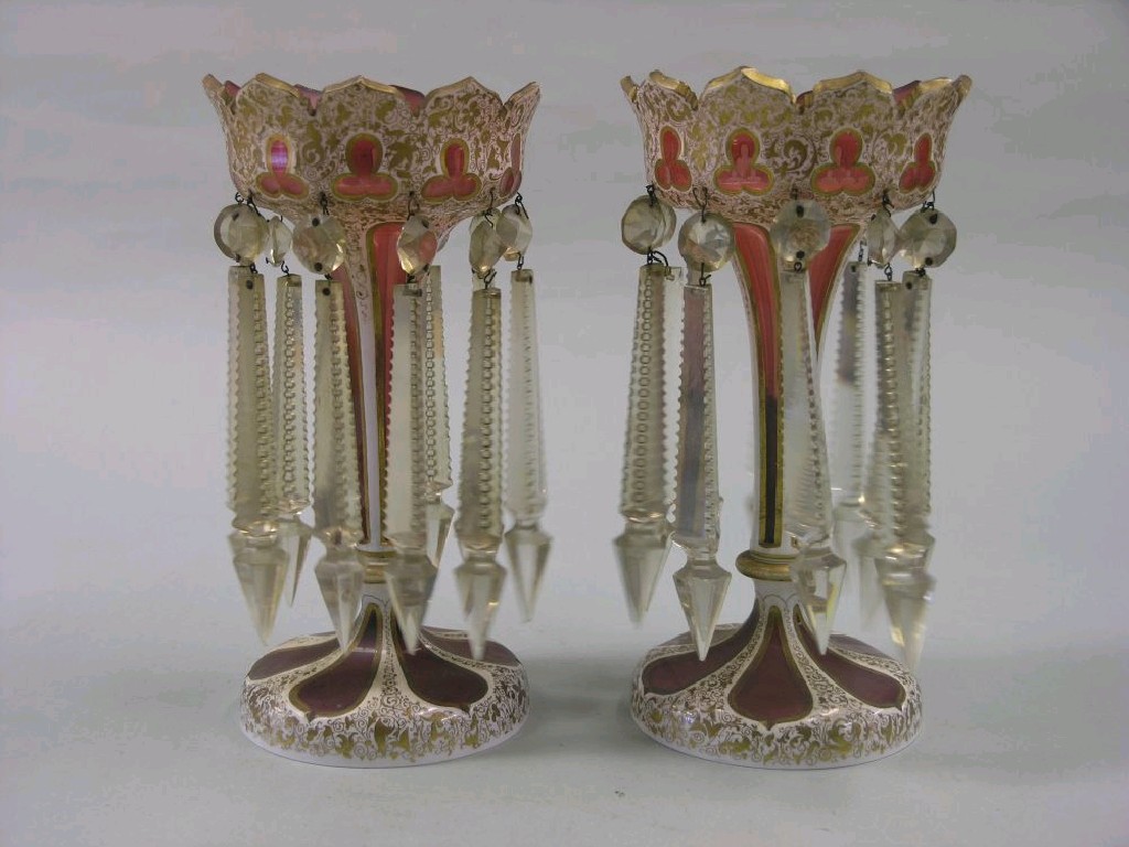 Appraisal: A pair of th century Bohemian overlaid glass goblets lobed