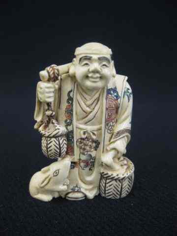 Appraisal: Carved Ivory Netsuke of a Farmer holding tools animal at