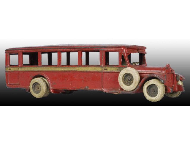 Appraisal: Cast Iron Arcade Parlor Coach Bus Toy Description Red with