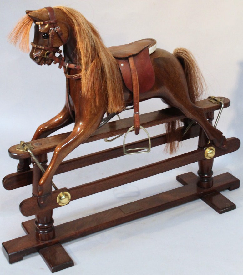 Appraisal: A Peverel Sapp hand made mahogany rocking horse with leather