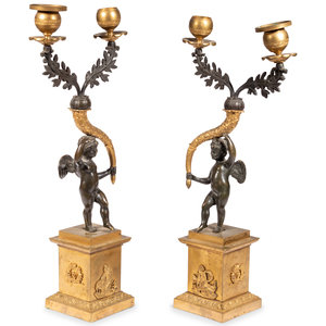 Appraisal: A Pair of Gilt and Patinated Bronze Figural Two-Light Candelabra