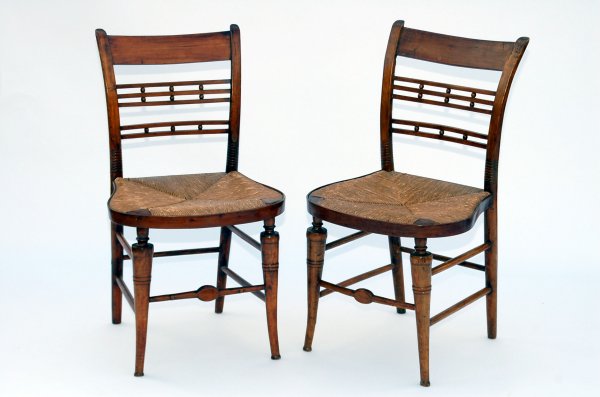 Appraisal: Pair of Sheraton side chairs of mixed woods having horseshoe