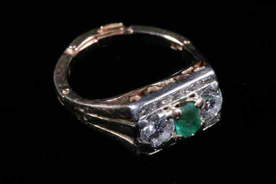 Appraisal: K YELLOW GOLD PLATINUM EMERALD AND DIAMOND RING Emerald-cut emerald