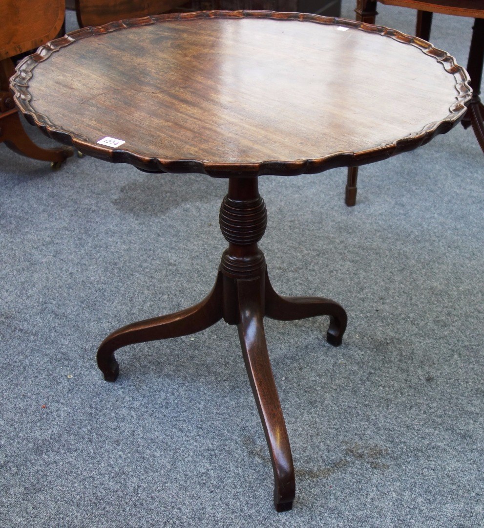 Appraisal: A th century mahogany occasional table with pie crust snap