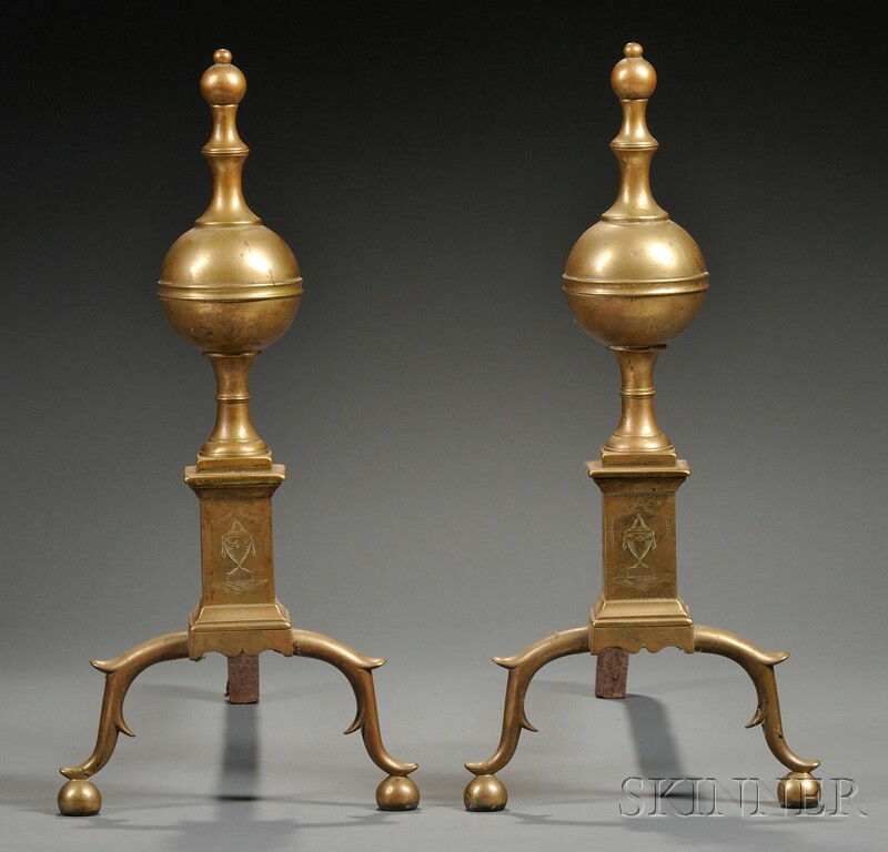 Appraisal: Pair of Brass and Iron Ball-top Andirons with Engraved Decoration