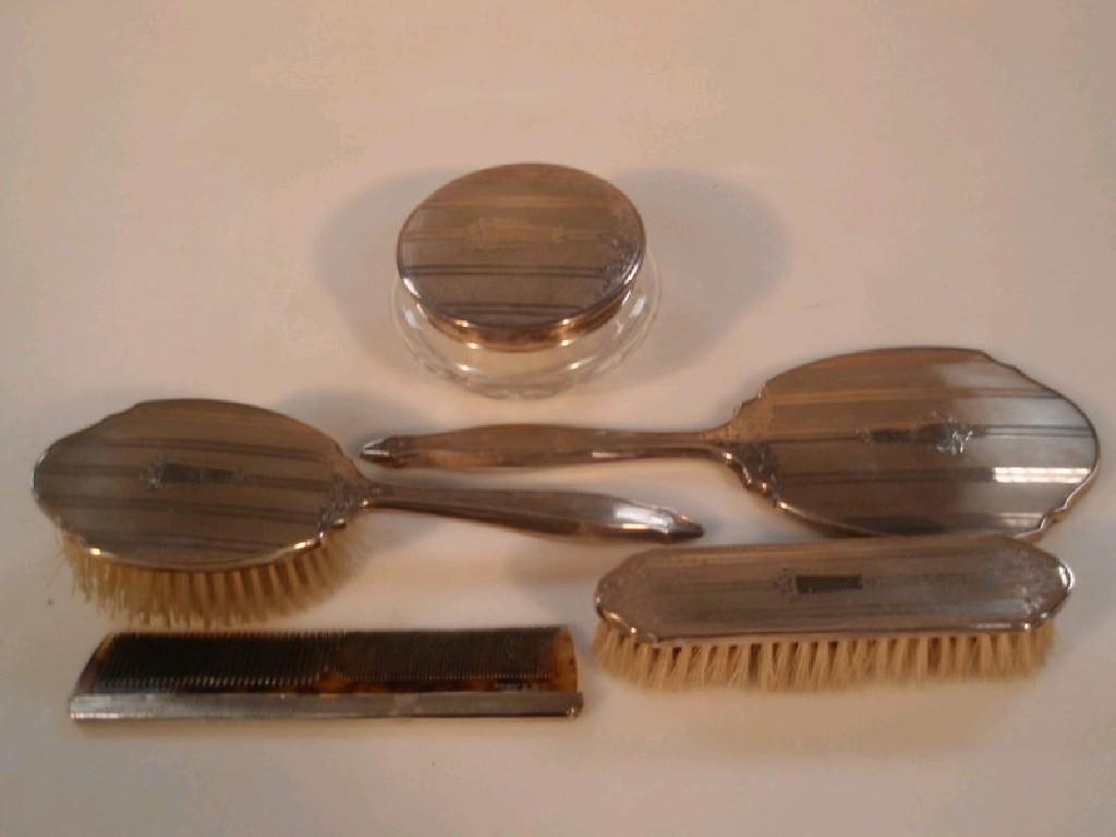 Appraisal: A thC silver backed dressing table set Birmingham comprising hairbrush