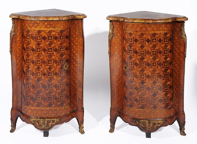 Appraisal: A PAIR OF LOUIS XVI MARQUETRY ENCOIGNURES by Jacques-Laurent Cosson