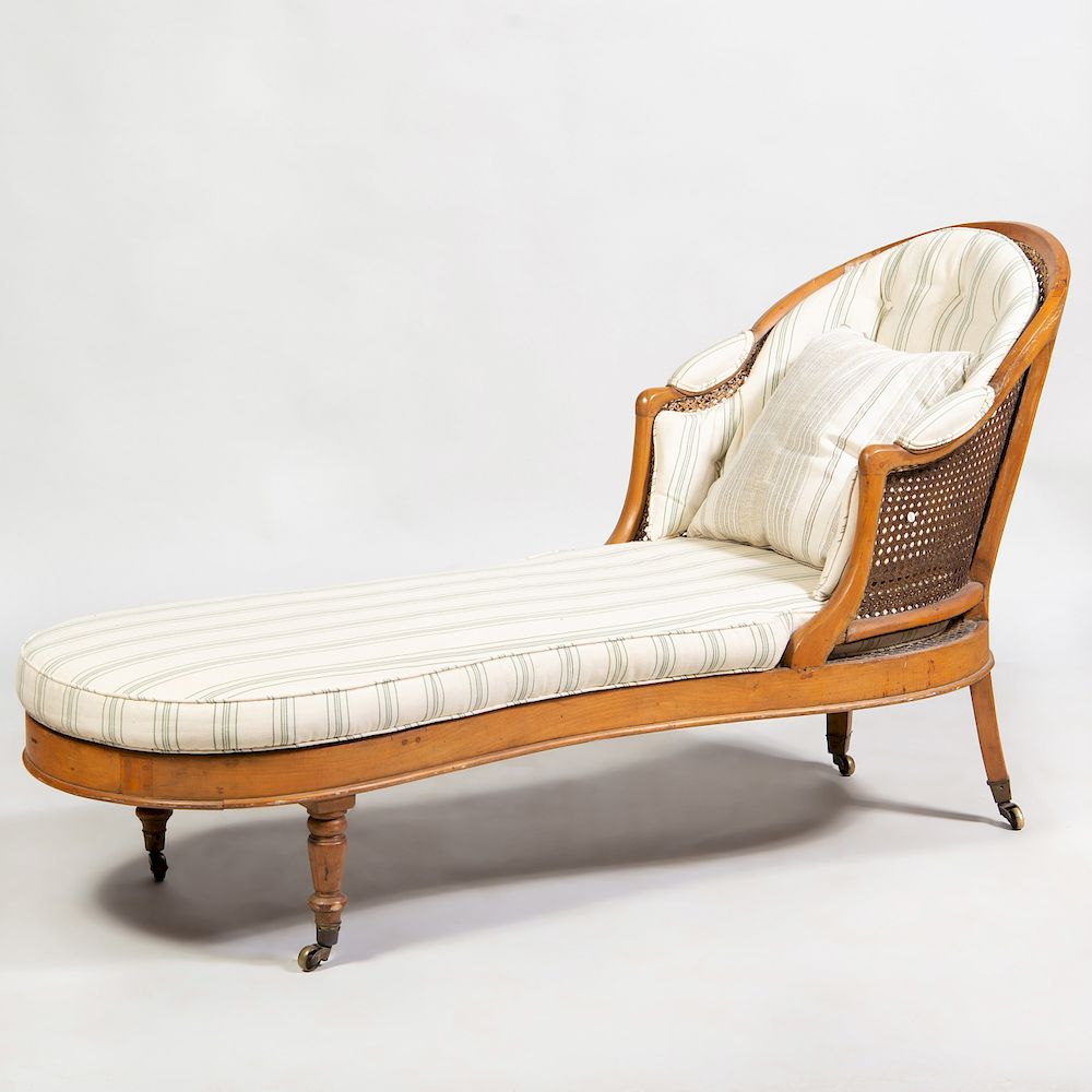 Appraisal: Edwardian Fruitwood and Caned Chaise Lounge Fitted with upholstered seat