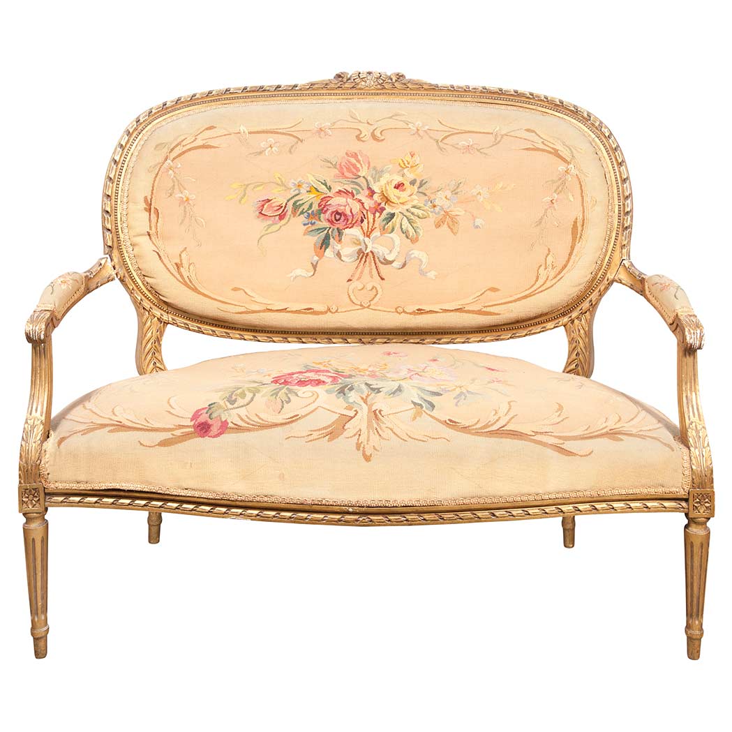 Appraisal: Louis XVI Style Carved and Giltwood Settee The foliate and