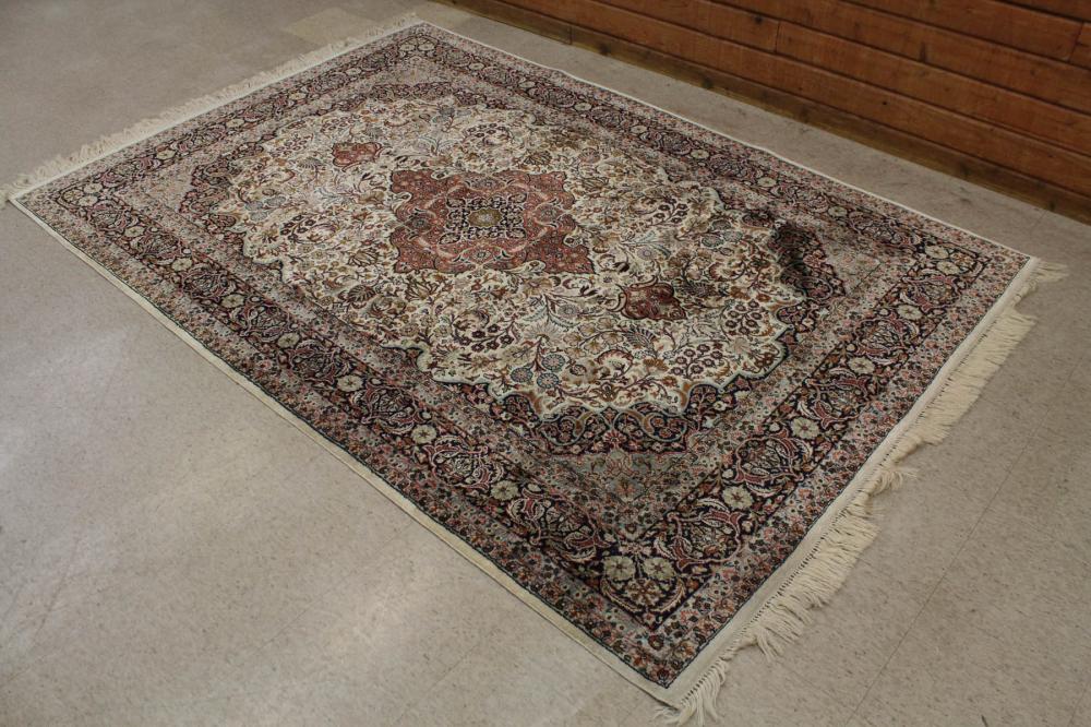 Appraisal: HAND KNOTTED SILK-LIKE ORIENTAL CARPET Indo-Persian floral and central floral