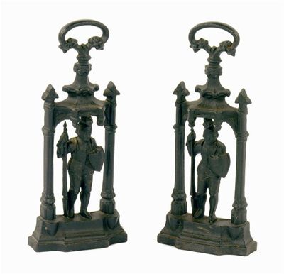 Appraisal: A pair of cast iron 'knight' door stops in cm