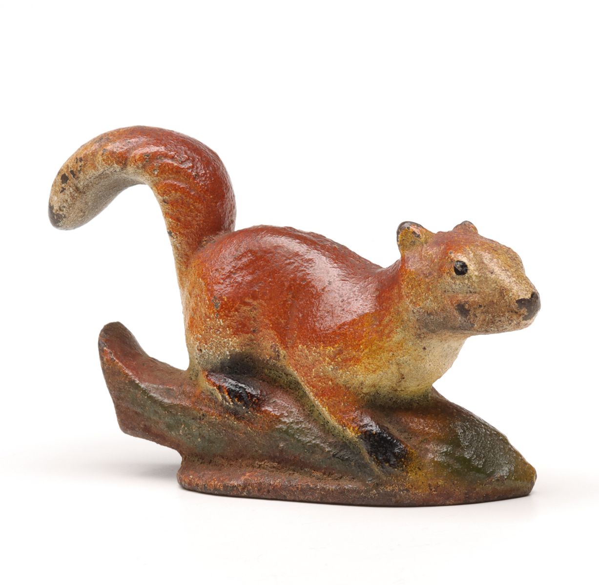 Appraisal: A VINTAGE FIGURAL SQUIRREL CAST IRON BOTTLE OPENERAn original period