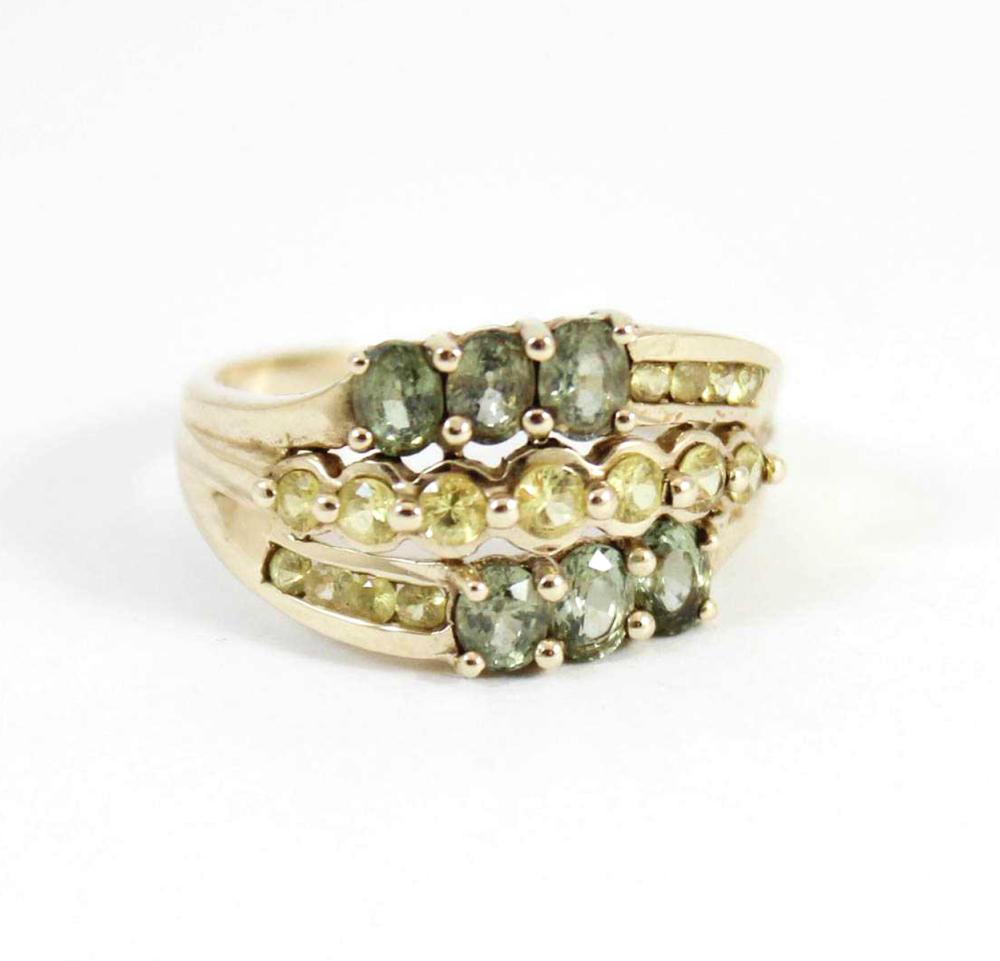 Appraisal: YELLOW AND GREEN SAPPHIRE RING The k gold ring set