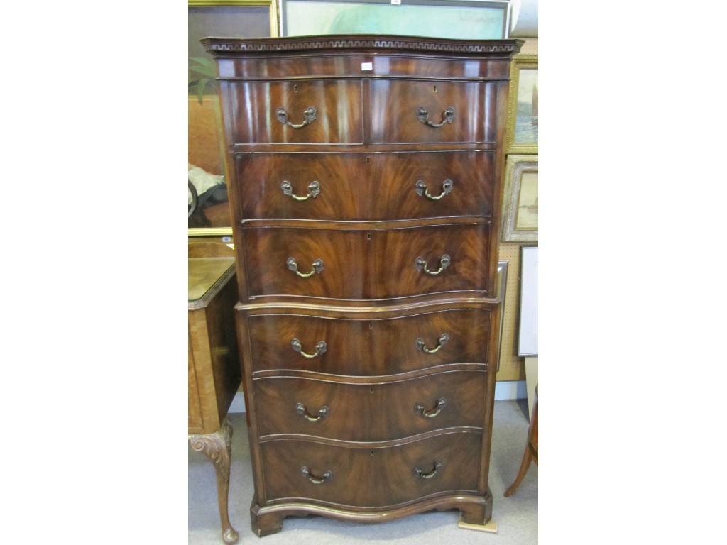 Appraisal: Mahogany serpentine front chest on chest