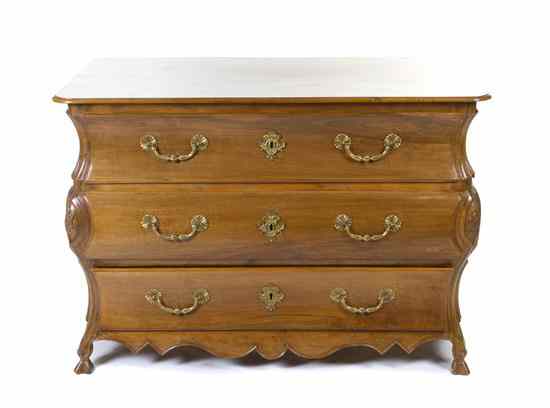 Appraisal: A Regence Style Walnut Commode having a rectangular top with