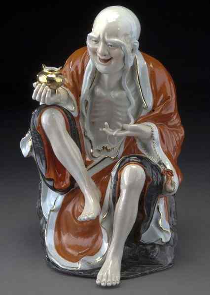 Appraisal: Chinese Republic famille rose porcelain long browLohan seated on a