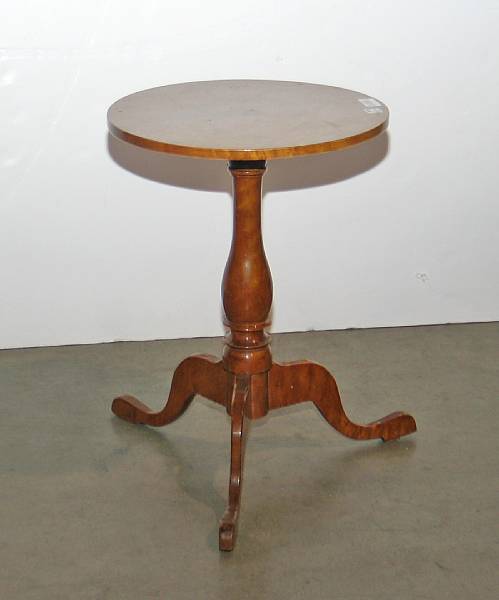 Appraisal: A George III style maple tea table mid th century