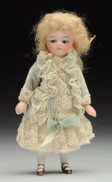 Appraisal: Dainty All-Bisque Mignonnette Doll French-type all-bisque with swivel neck stationary