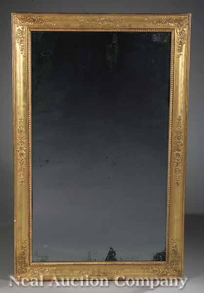 Appraisal: A Late Georgian Carved and Gilt Looking Glass c molded