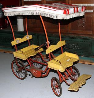 Appraisal: Gym Dandy surrey pedal car this surrey on a local