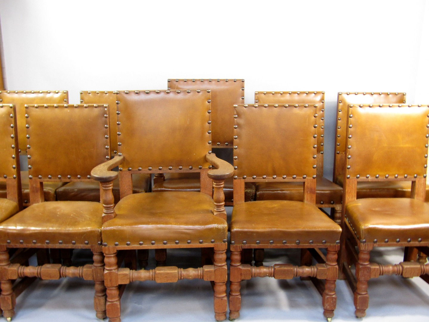 Appraisal: A set of nine oak framed dining chairs former property