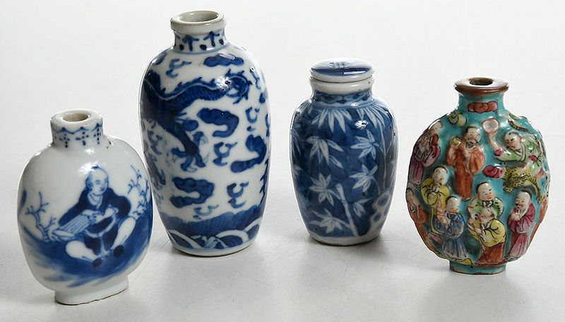 Appraisal: Four Blue and White and Famille Rose Bottles Qing dynasty