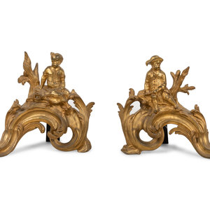 Appraisal: A Pair of Louis XV Style Gilt Bronze Figural Chenets