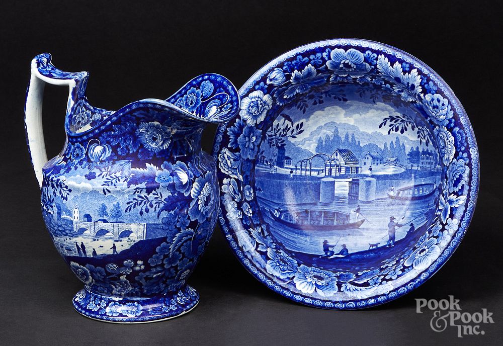 Appraisal: Historical blue Staffordshire pitcher and basin Historical blue Staffordshire Erie