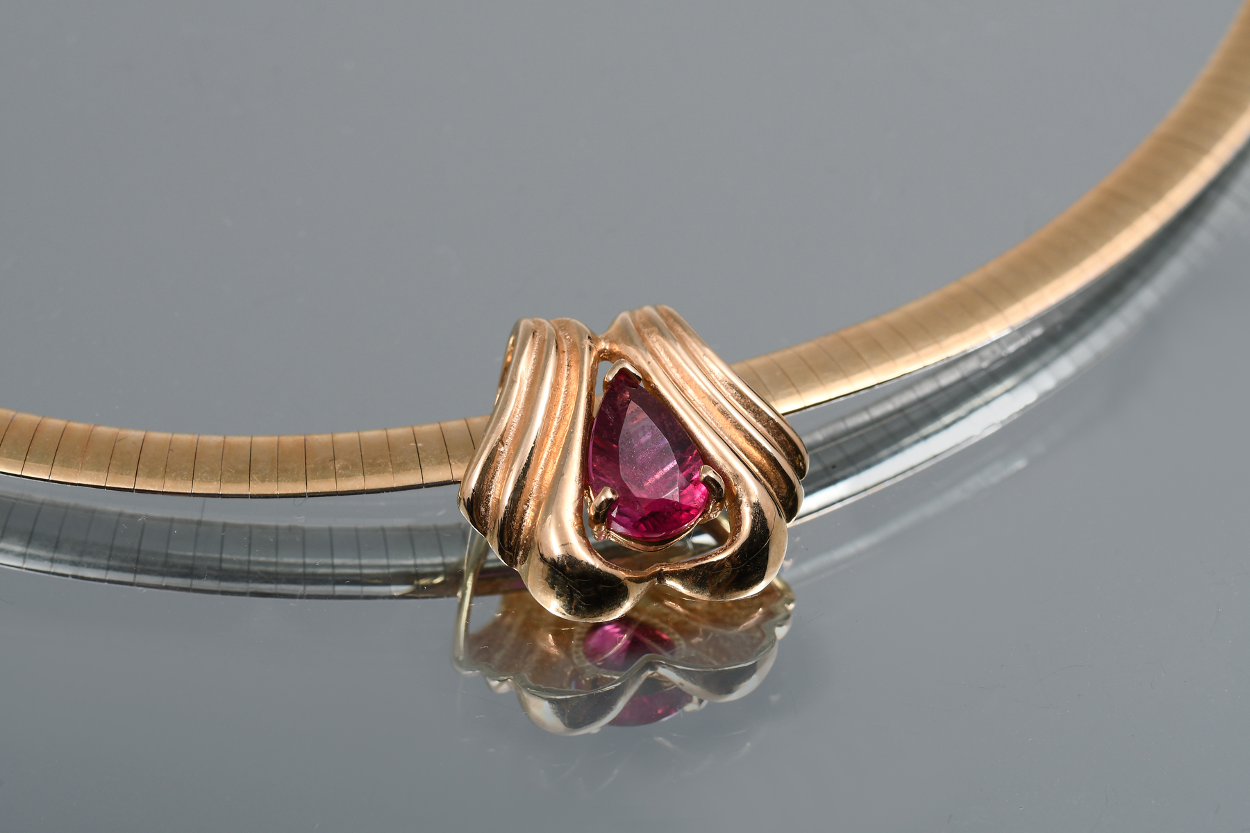 Appraisal: K RUBELLITE PENDANT OMEGA CHAIN K Yellow Gold Slide Pendant