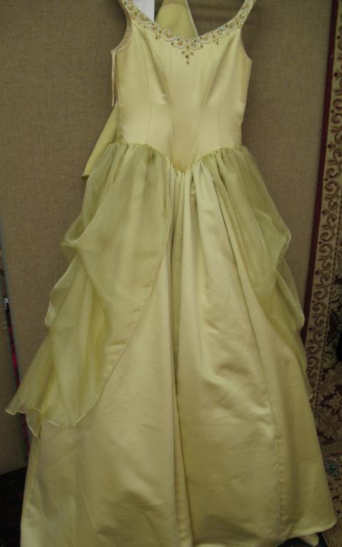 Appraisal: Dizzie Lizzie Torquay A full length gold coloured wedding dress