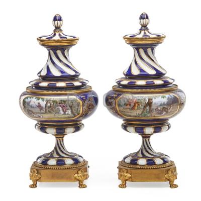 Appraisal: PAIR OF SEVRES STYLE BRONZE MOUNTED COVERED VASES Condition Report