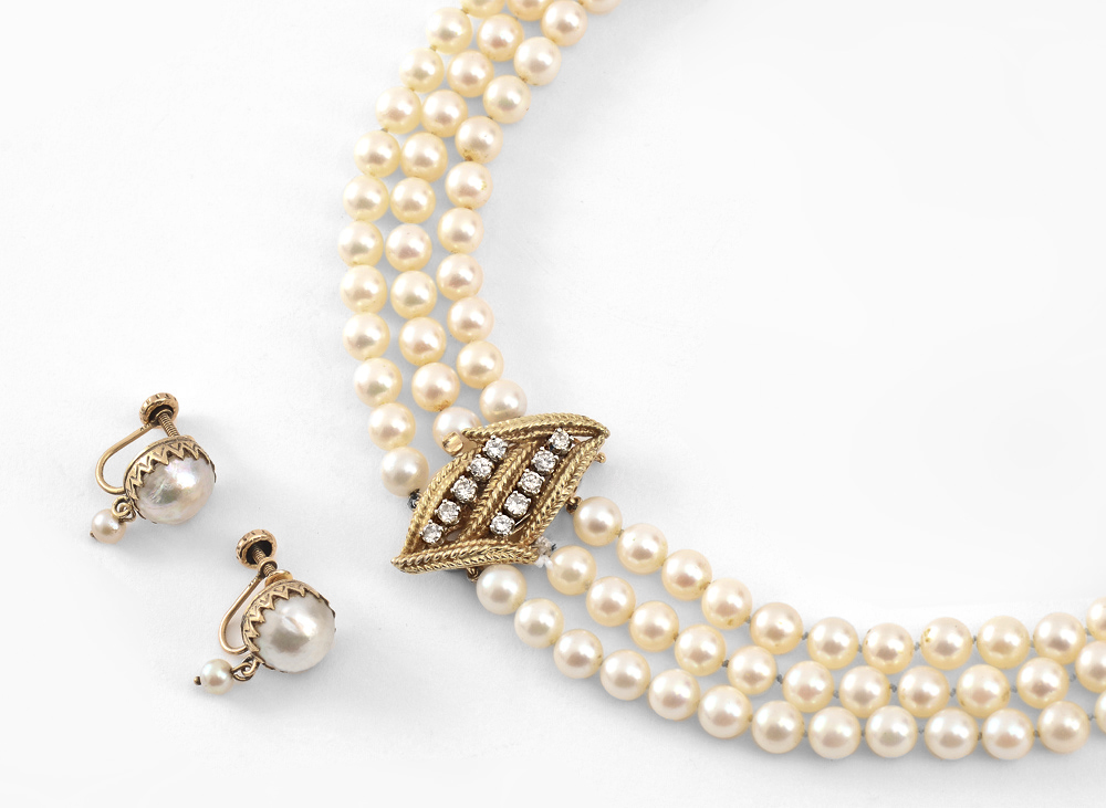 Appraisal: TRIPLE STRAND OF LUXURIOUS PEARLS WITH DIAMOND CLASP A decadent