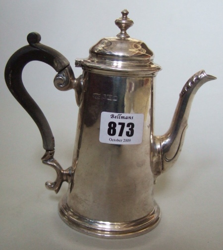 Appraisal: A silver coffee pot of tapering cylindrical form and with