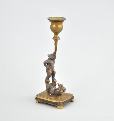 Appraisal: A Whimsical Figural Candleholder of Bears Bronze postured as a