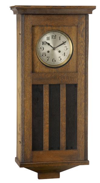 Appraisal: WALL CLOCK In oak case with chime and strike mechanism