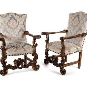 Appraisal: A Pair of Italian Baroque Style Parcel Gilt Walnut Armchairs