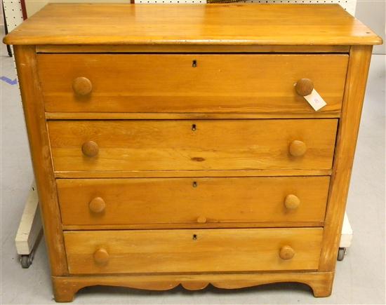 Appraisal: Four drawer chest c pine with stripped finish wood knob