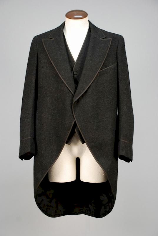 Appraisal: GENTS CUTAWAY WOOL COAT and VEST EARLY th C Black