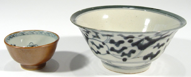 Appraisal: Oriental porcelain tea bowl painted with blue flowers with caf