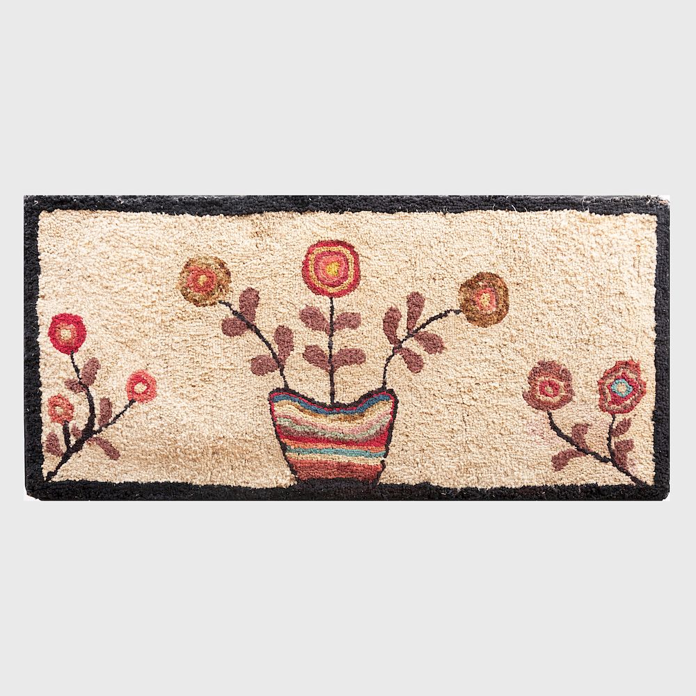 Appraisal: Two American Floral Hooked Rugs Each stretched on frame The