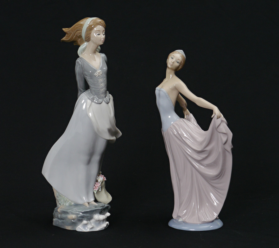 Appraisal: LLADRO PORCELAIN FIGURINES WIND BLOWN GIRL Salvador Debon sculptor issued