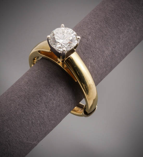 Appraisal: -Karat Yellow-Gold and White-Gold Solitaire Diamond Ring The four-prong mount