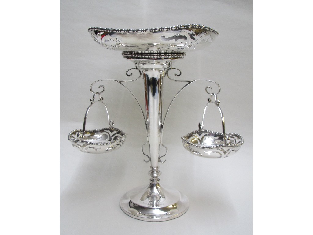 Appraisal: A silver fruit and flower epergne the pierced central bowl